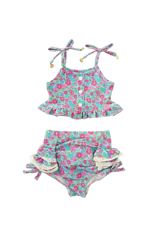Floral two-piece swimsuit with ruffled details on a white background