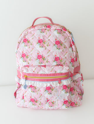 Floral patterned backpack on a white background
